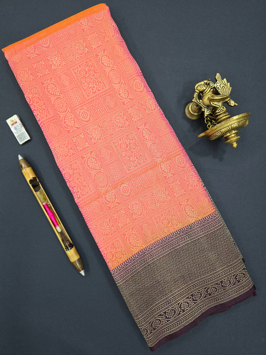 Elevate your style with our stunning Sunkissed Orange Kanchipuram Soft Silk Sarees with a classic Black Border