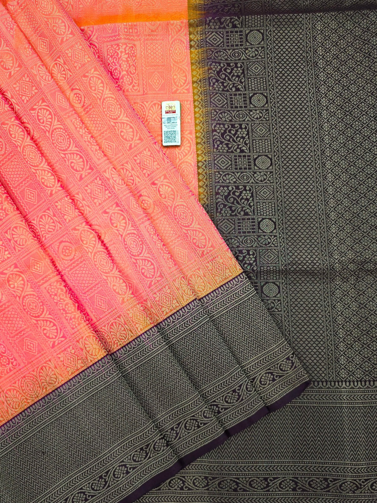 Elevate your style with our stunning Sunkissed Orange Kanchipuram Soft Silk Sarees with a classic Black Border Elevate your style with our stunning Sunkissed Orange Kanchipuram Soft Silk Sarees with a classic Black Border