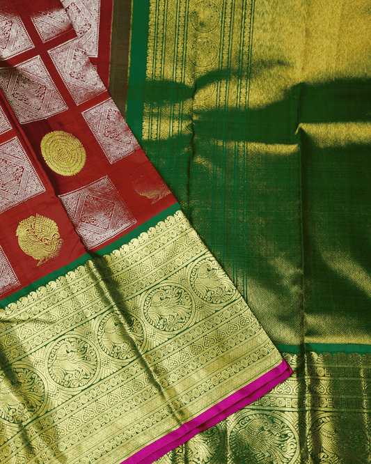 Rust & Green Kanchipuram Silk Saree featuring Korvai Border, Peacock Motifs & Square Butta with Gold & Silver Zari