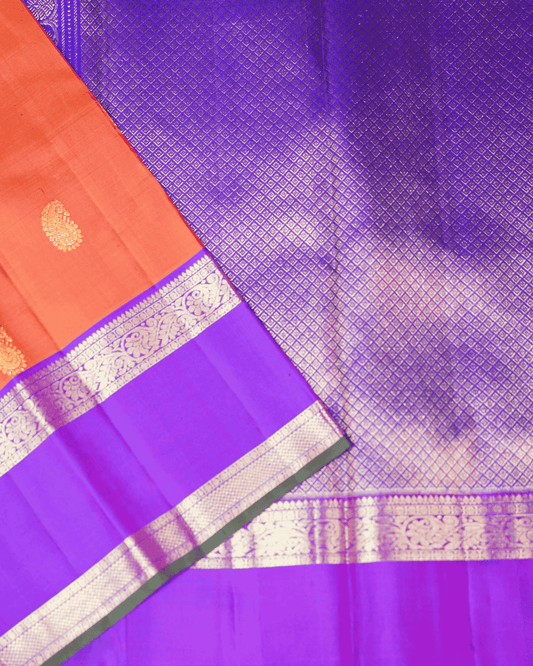 Luxurious Kanchipuram Silk Saree in Vibrant Orangish Pink & Violet with Dual Rettai Border, Mango Butta Motifs, and Premium One Gram Gold Zari