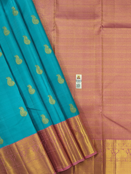 Elegant blue designer silk saree with delicate light pink Korvai traditional border