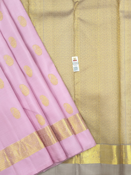Pink and gold silk saree with intricate gold border design