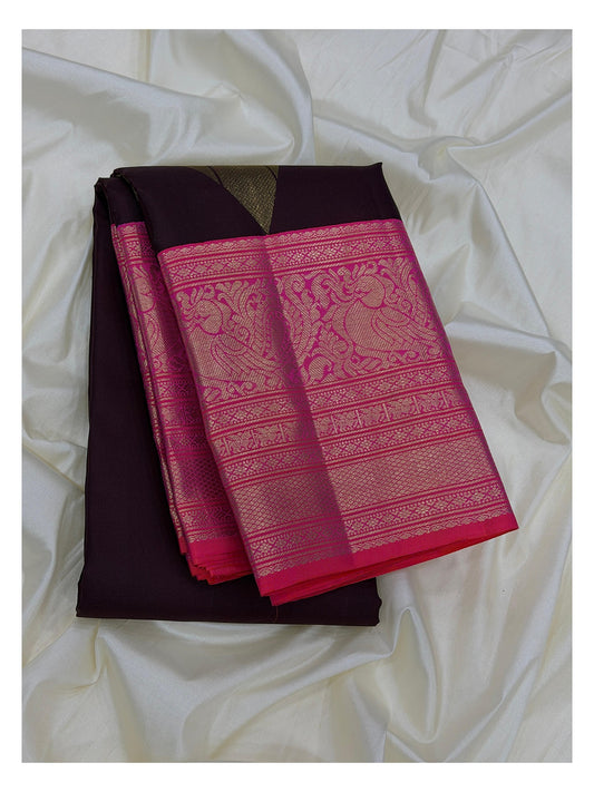 Handwoven Kanchipuram Silk Saree in Deep Plum with Magenta Zari Peacock Border front view