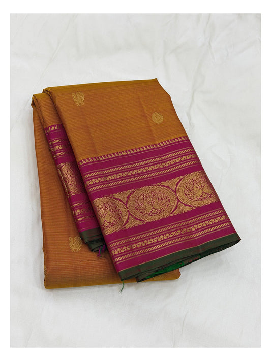 Handwoven Kanchipuram Silk Saree in Mustard with Magenta Figurative Border and Rich Pallu front view