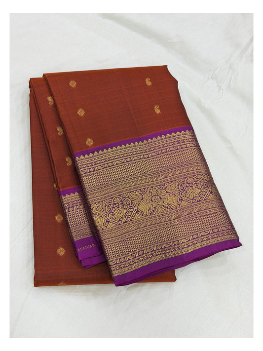 Pure Silk Saree in Rust Brown with Magenta Zari Border front view