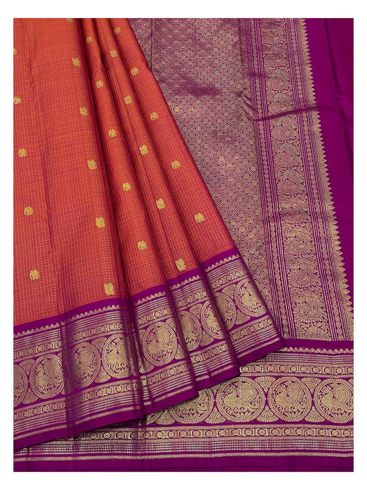 Rust Orange Handwoven Kanchipuram Silk Saree with Magenta Contrast Pallu and Peacock Border front view