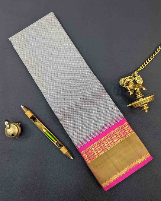 Luxurious Royal Grey Kancheepuram Silk Saree featuring a delicate gold border