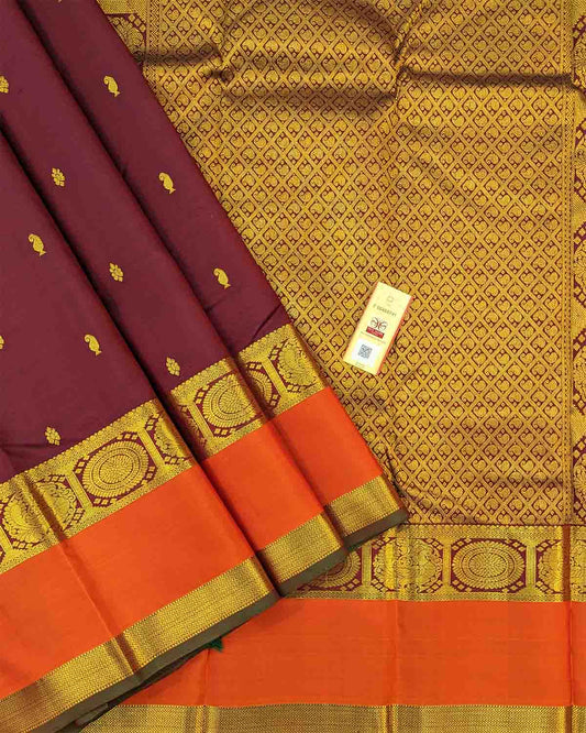 Dark red and orange silk saree with Annam Border, featuring gold