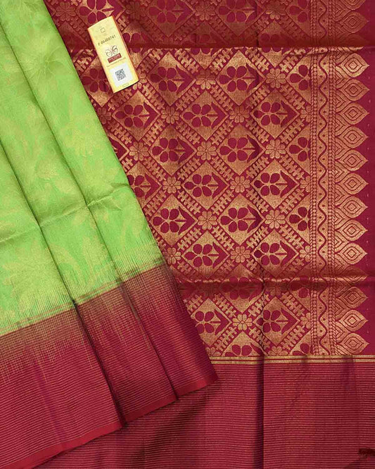 Lively green Kanchipuram soft silk sarees with vine buttas and frugal pallu.