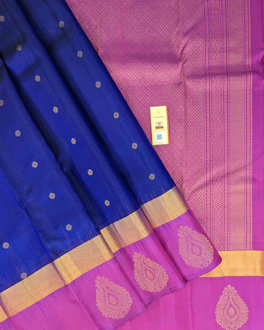 Traditional dark blue silk saree from Kancheepuram with zari border and detailed pallu