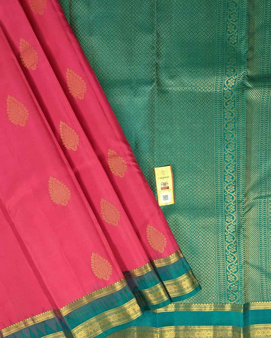 Pink Kancheepuram Silk Saree with Green Lineated Border & Leaf-Shaped Motifs