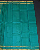 Blue Traditionally Kancheepuram Silk Sarees With Paisley Buttas And Ornate Pallu Green Border