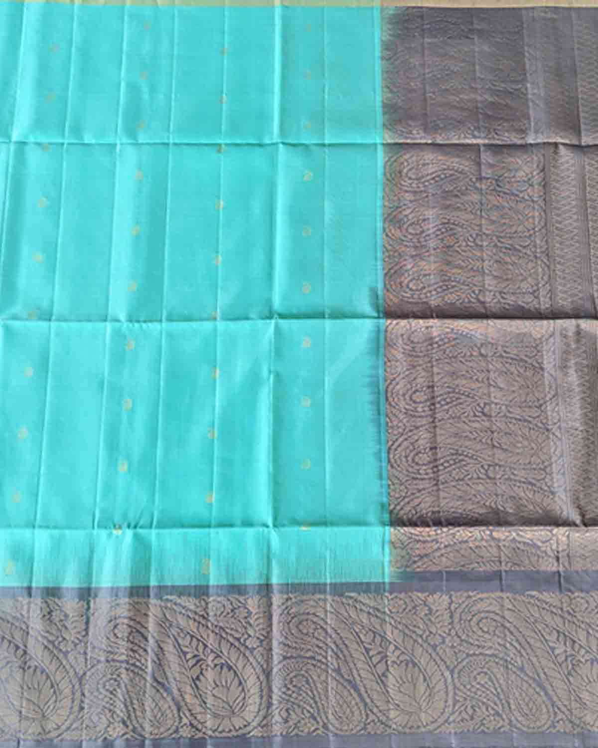 Elegant blue Kanchipuram soft silk saree featuring Annapakshi buttas and ash border