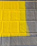 Yellow Kanchipuram soft silk saree with mango motifs, Annapakshi buttas, and paisley zari border