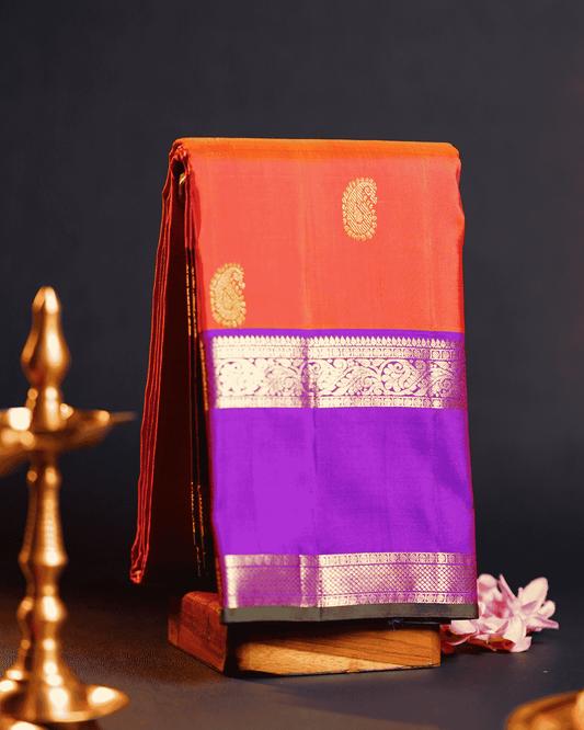 Luxurious Kanchipuram Silk Saree in Vibrant Orangish Pink & Violet with Dual Rettai Border, Mango Butta Motifs, and Premium One Gram Gold Zari