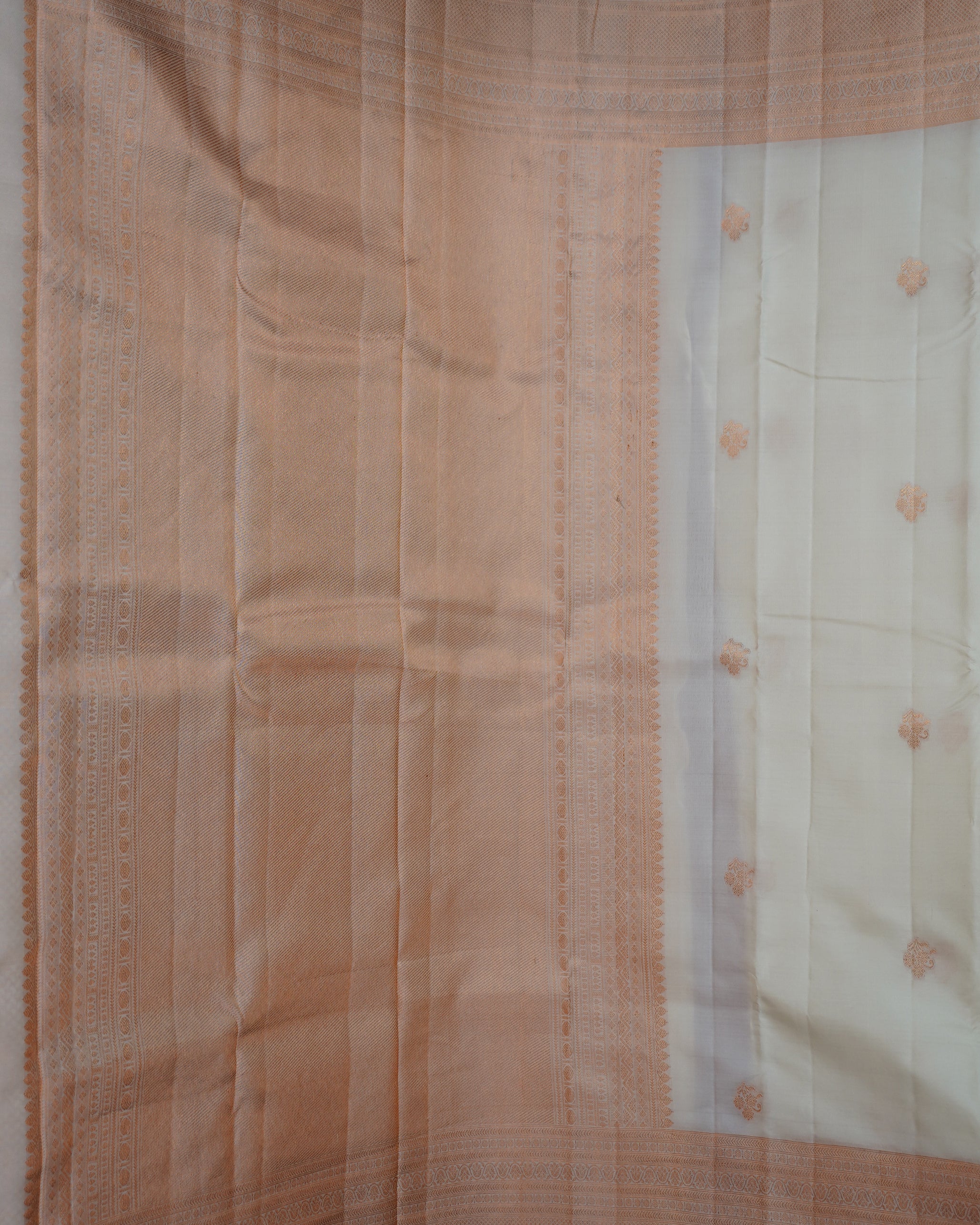 Turning Border Half White Antique Copper Color Zari Silk Saree