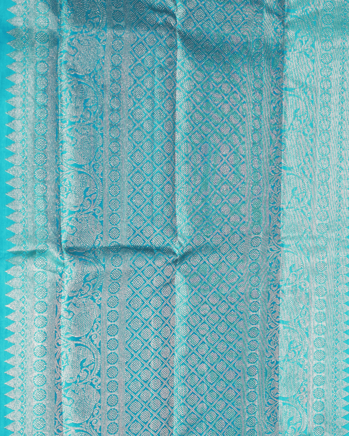 Violet Borderless Kanchipuram Pure Silk Saree adorned with Elegant Tree Bird Butta Motifs and Opulent Two Gram Gold Zari