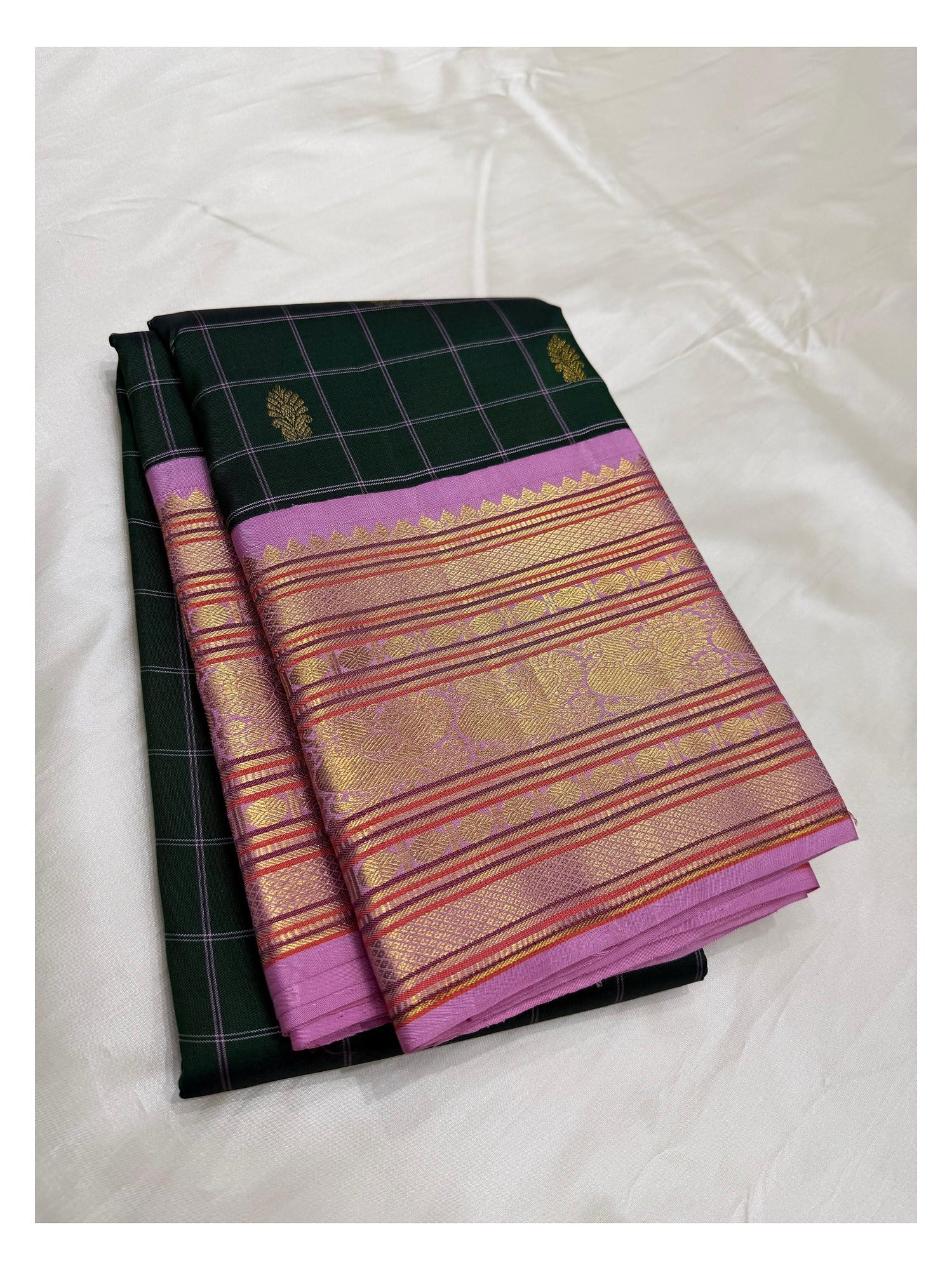 Dark Green Handwoven Kanchipuram Silk Saree with Pink Zari Border front view