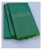 Green Handwoven Kanchipuram Silk Saree with Silver Zari Border front view