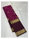 Checked body view of the handwoven Kanchipuram silk saree in deep magenta with plum border and pallu