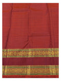 Close-up of the maroon border with gold-toned woven motifs and fine stripe texture on the saree body