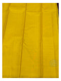 Contrast yellow section of the handwoven Kanchipuram silk saree with gold-toned woven motif