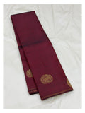 Folded view of deep wine handwoven Kanchipuram silk saree with pure zari detailing