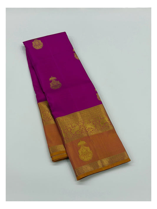 Handwoven Kanchipuram Silk Saree in Bright Magenta with Mustard-Gold Peacock Border front view