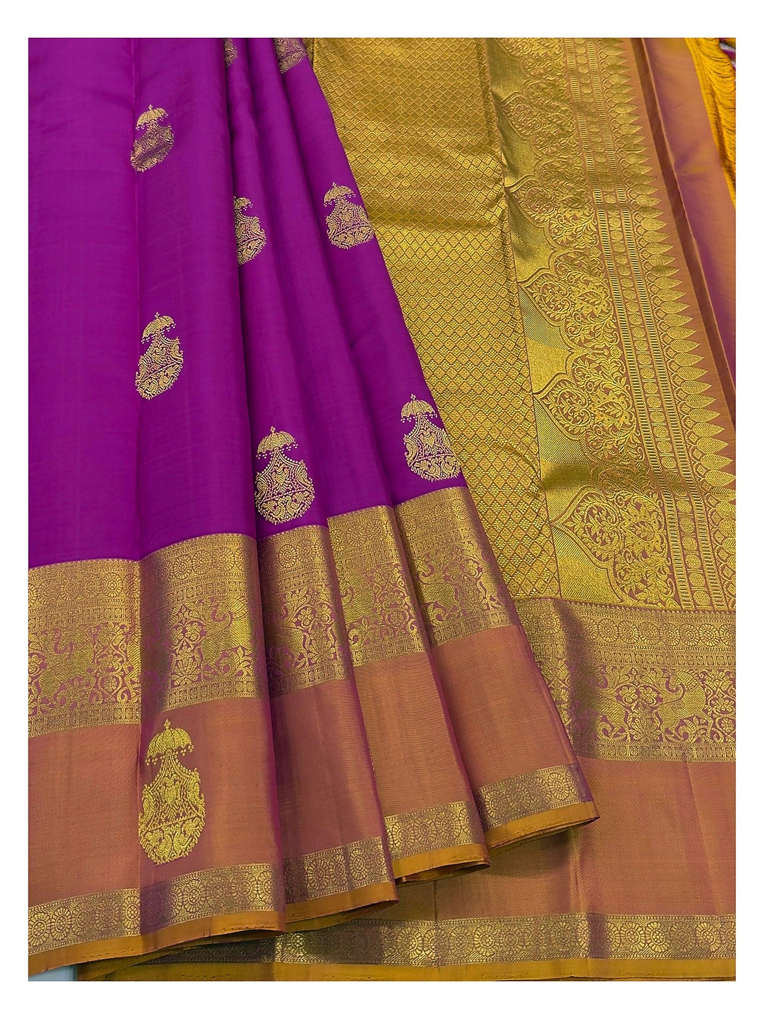 Handwoven Kanchipuram Silk Saree in Bright Magenta with Mustard-Gold Peacock Border