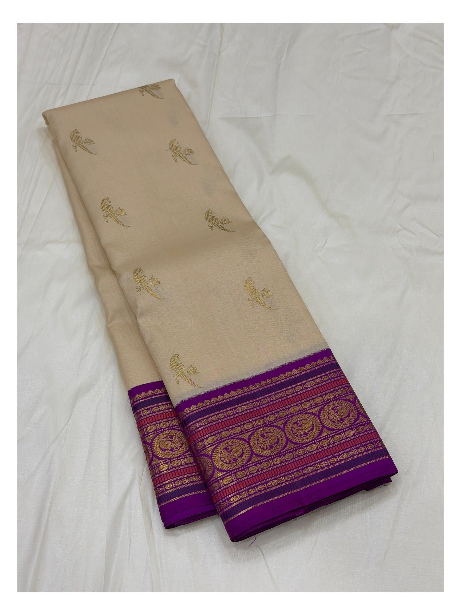 Handwoven Kanchipuram Silk Saree in Cream with Purple Border