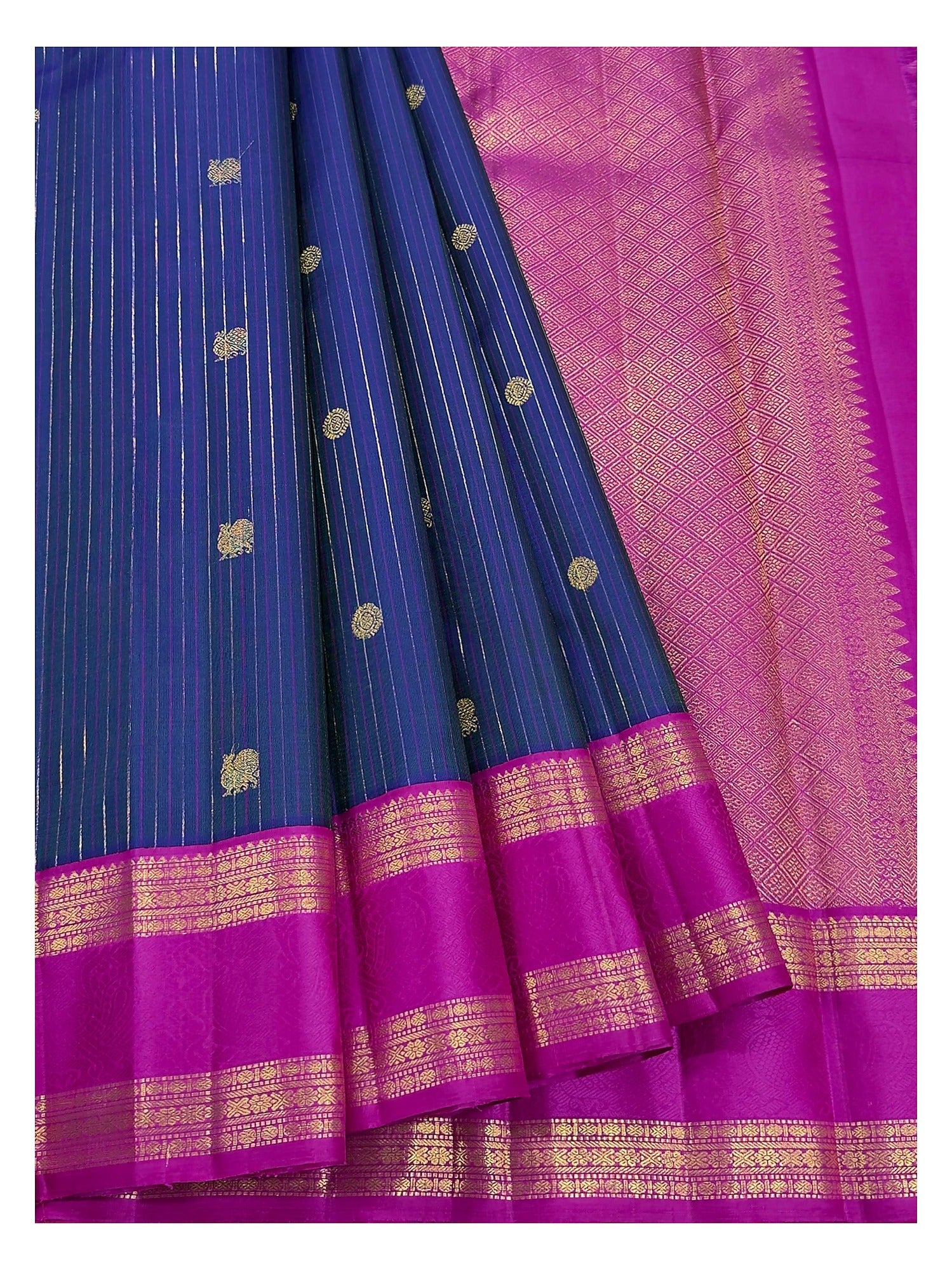 Deep blue body with woven motifs and pink pallu detail on Kanchipuram silk saree