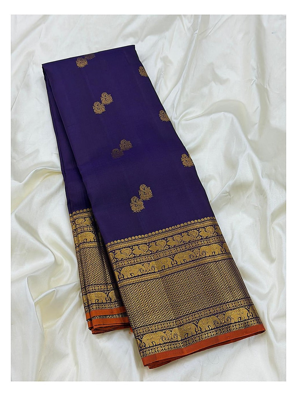 Handwoven Kanchipuram Silk Saree in Deep Purple with Elephant Zari Border