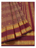 Handwoven Kanchipuram Silk Saree in Deep Wine with Gold Buttas and Ornate Woven Border