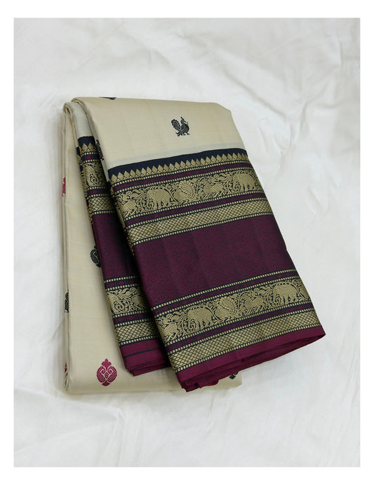 Handwoven Kanchipuram Silk Saree in Ivory with Black and Magenta Elephant Border front view