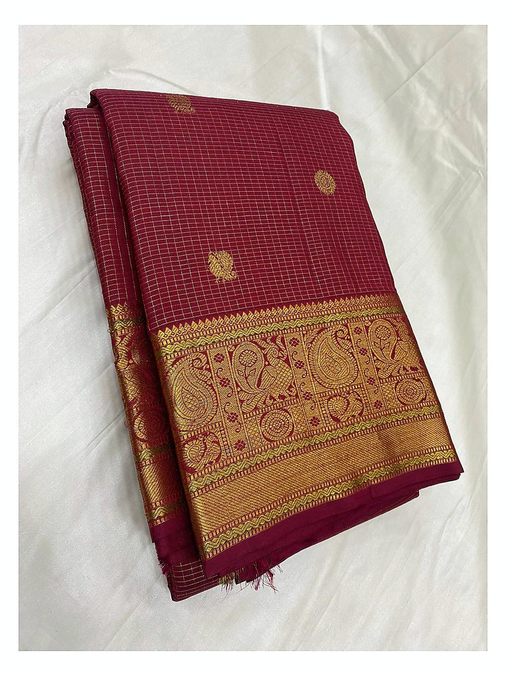 Handwoven Kanchipuram Silk Saree in Maroon with Rich Gold Zari Border front view