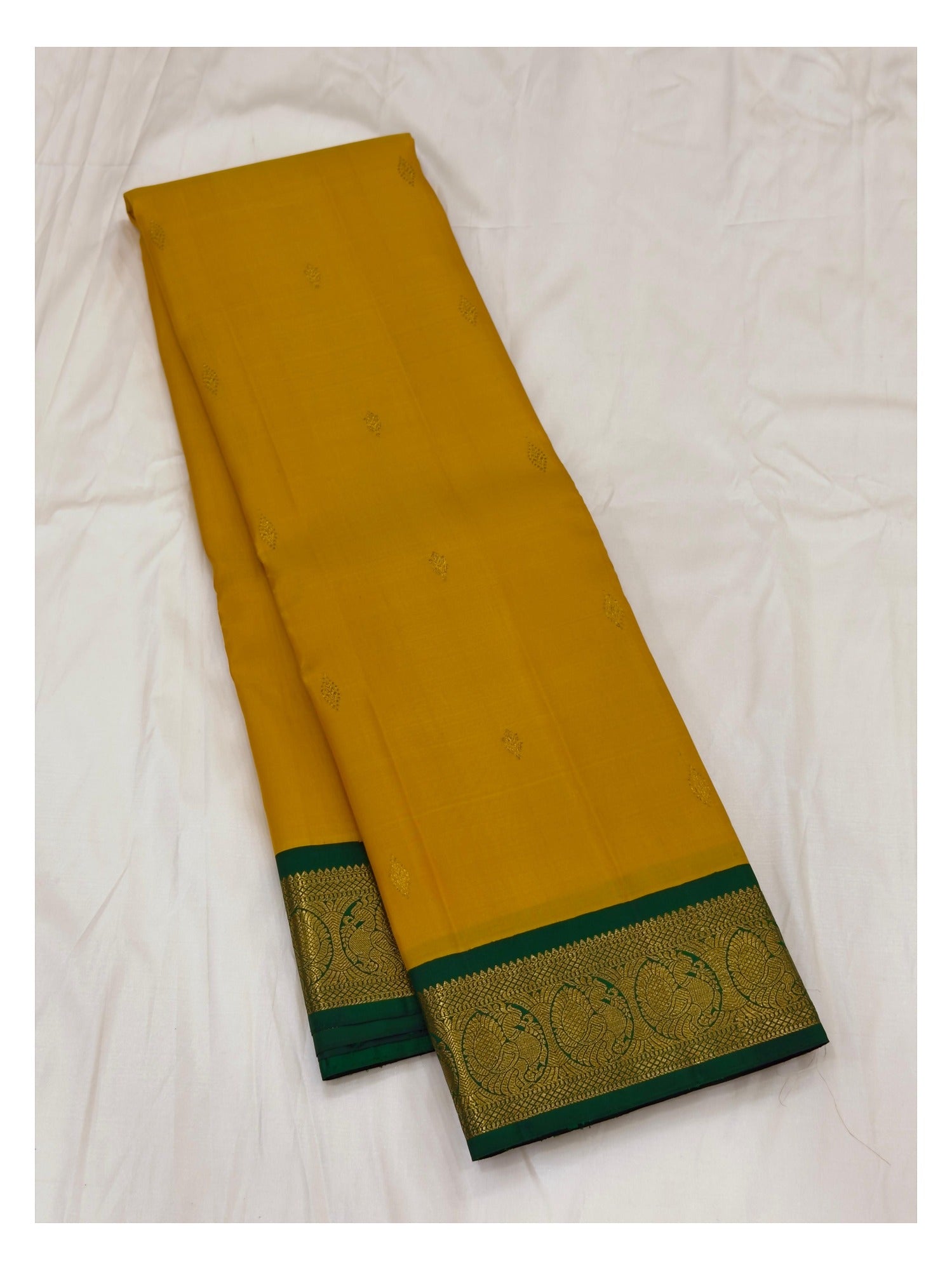 Handwoven Kanchipuram Silk Saree in Mustard Yellow with Emerald Green Zari Border