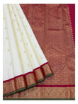 Handwoven Kanchipuram Silk Saree in Off-White with Gold Buttas and Magenta Contrast Pallu