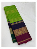 Handwoven Kanchipuram Silk Saree in Parrot Green with Navy Blue and Magenta Peacock Border