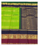 Handwoven Kanchipuram Silk Saree in Parrot Green with Navy Blue and Magenta Peacock Border