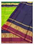 Handwoven Kanchipuram Silk Saree in Parrot Green with Navy Blue and Magenta Peacock Border