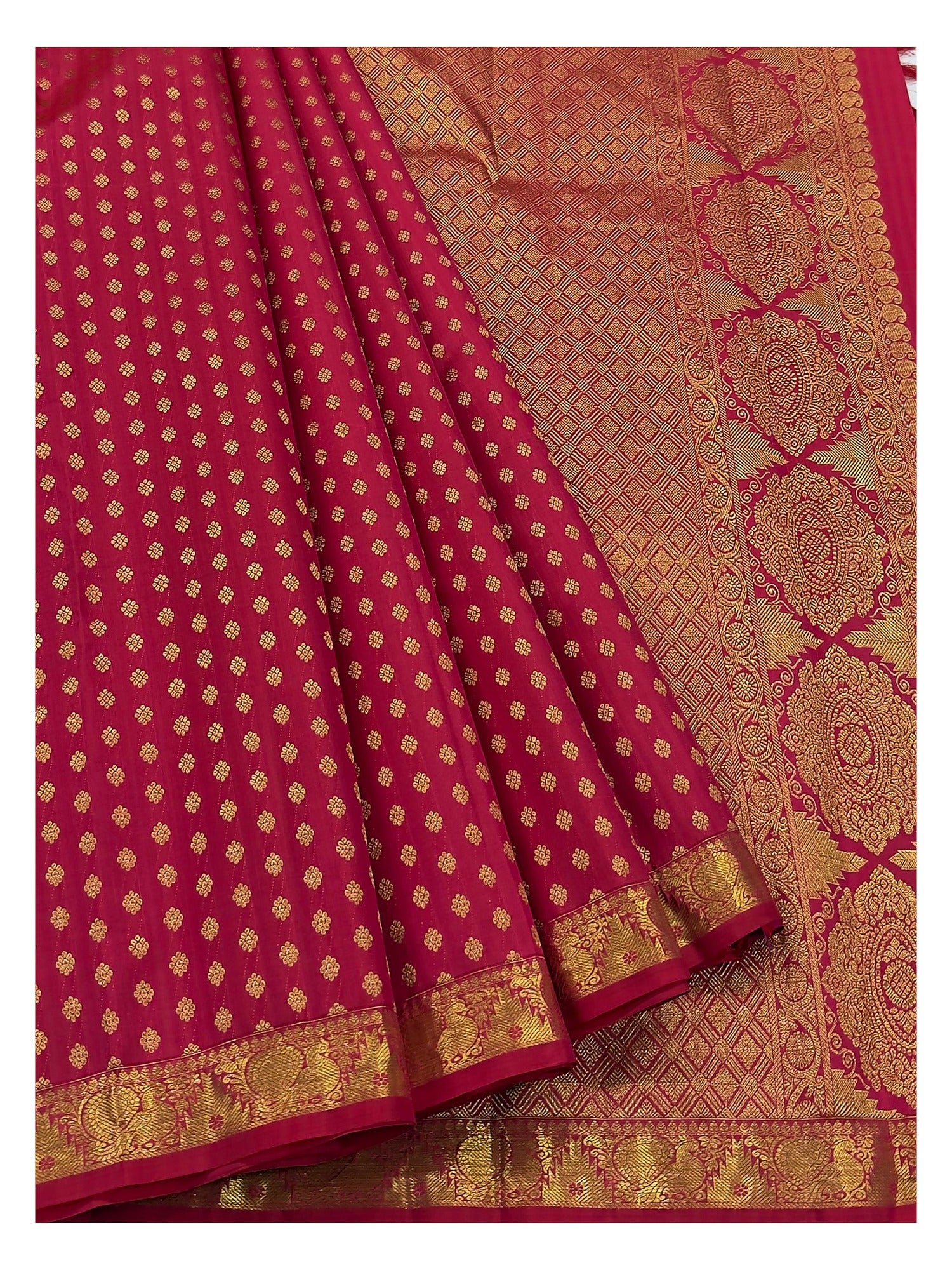 Rani pink handwoven silk saree with richly woven zari pallu and gold butta body