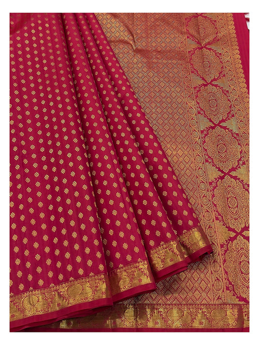 Rani pink handwoven silk saree with richly woven zari pallu and gold butta body