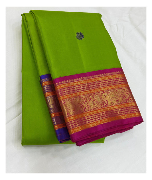Handwoven Kanchipuram Silk Saree - Parrot Green with Magenta Contrast Border front view