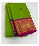 Handwoven Kanchipuram Silk Saree - Parrot Green with Magenta Contrast Border front view