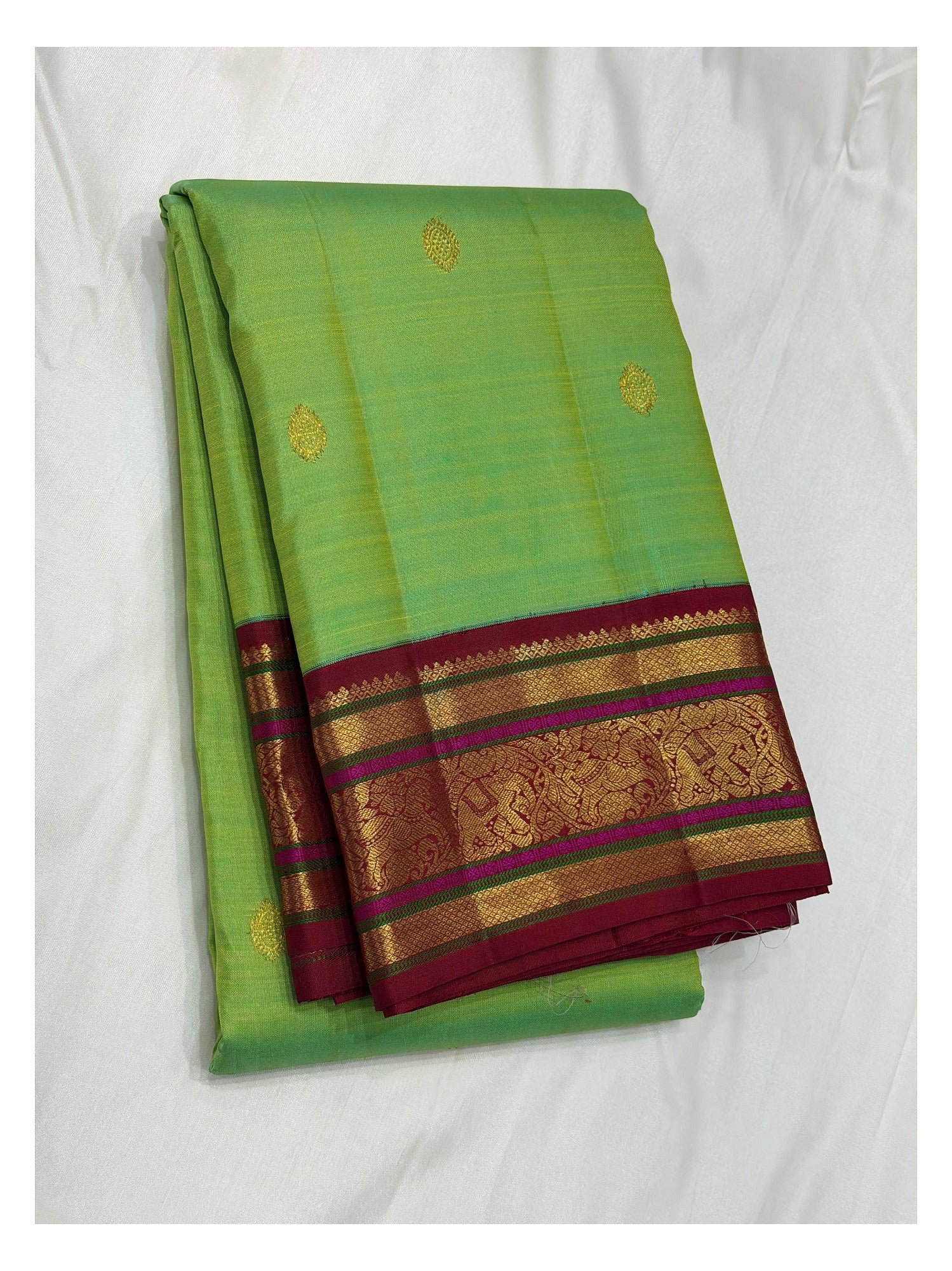 Handwoven Kanchipuram Silk Saree - Parrot Green with Maroon Elephant Border front view