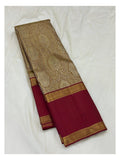 Full folded view of maroon Kanchipuram silk saree with antique gold woven motifs