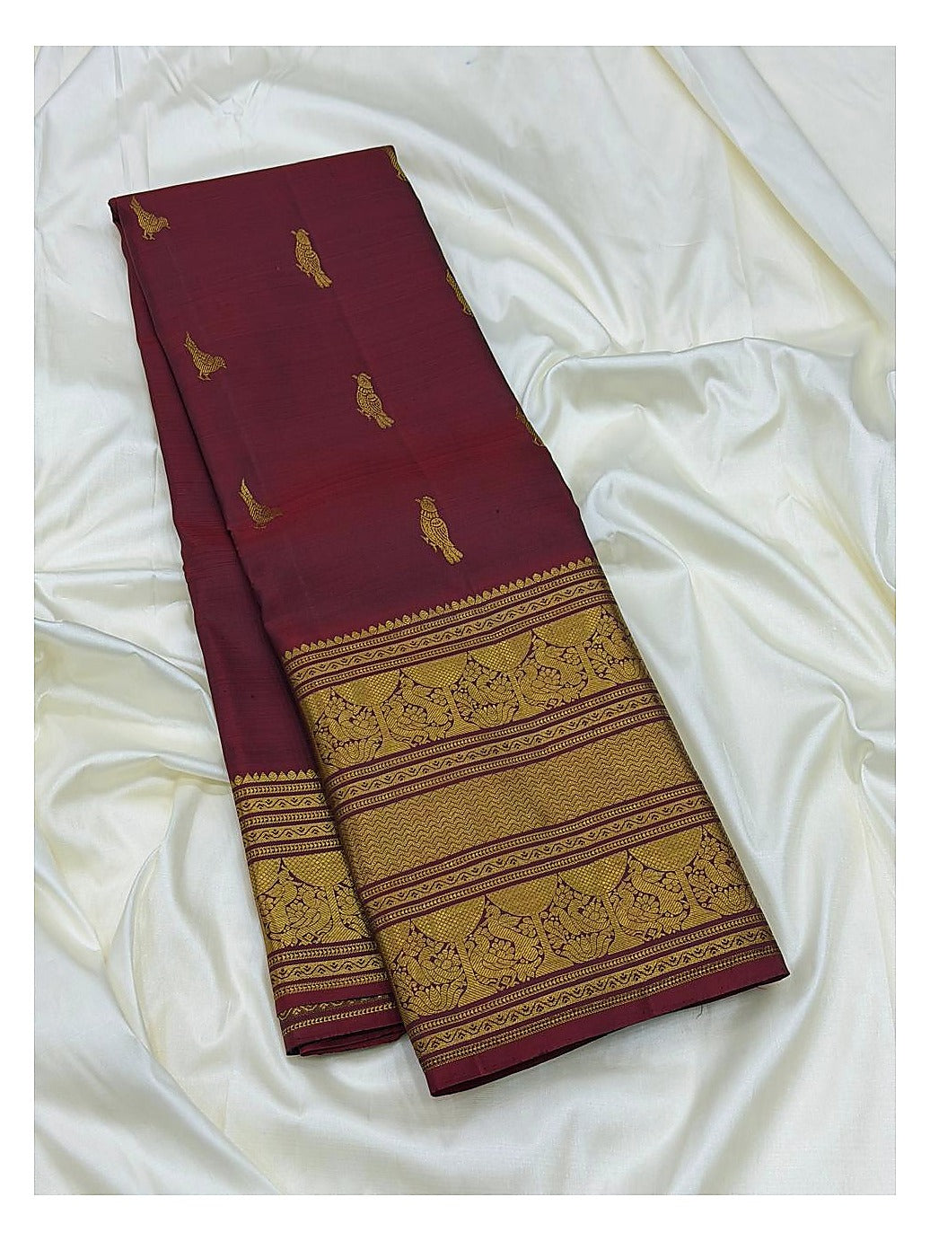 Maroon Handwoven Kanchipuram Silk Saree with Gold-Toned Peacock Border