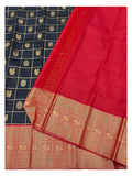 Handwoven silk saree showing navy blue body and rich red pallu with dense gold-toned woven detailing
