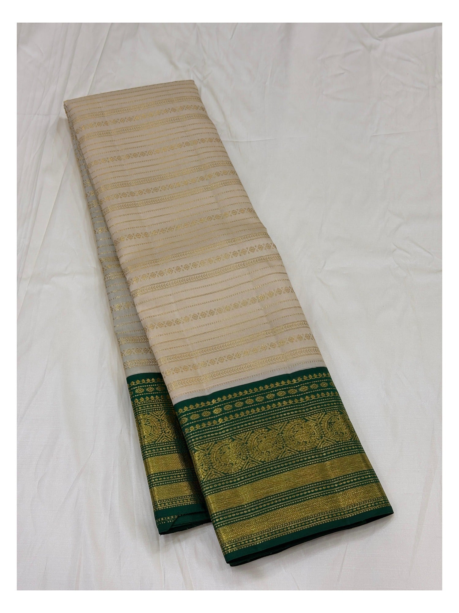 Off-White Handwoven Kanchipuram Silk Saree with Emerald Green Zari Border front view
