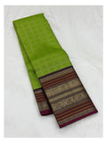 Parrot green saree body with checked woven texture and contrast border